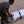 Man in military uniform with white rolled up Mobi-Tracks on sand