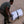 Man in military uniform with white rolled up Mobi-Tracks on sand